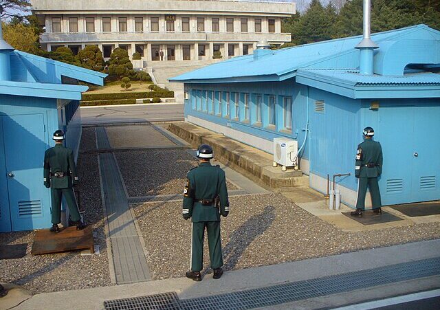 Soldier standing at the DMZ between North and South Korea.