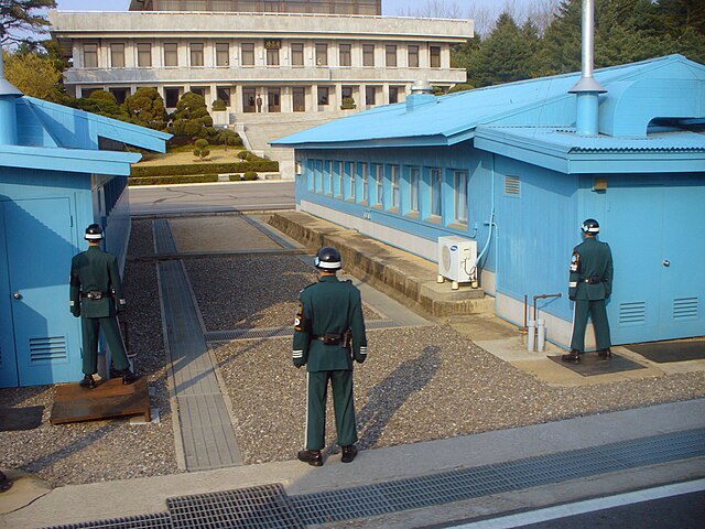 Soldier standing at the DMZ between North and South Korea.