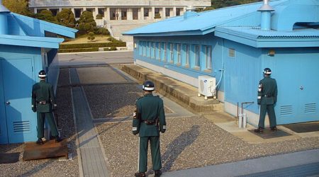 Soldier standing at the DMZ between North and South Korea.