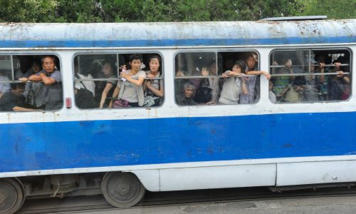 P35RFG Pjoengjang, North Korea, people in a crowded tram